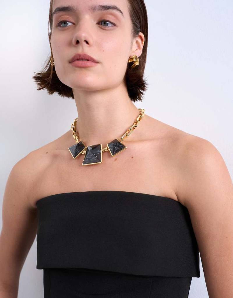 Topshop - Milo - Statement-Halskette in Goldoptik und Schwarz-Goldfarben Topshop - Milo - Statement-Halskette in Goldoptik und Schwarz-Goldfarben von Topshop