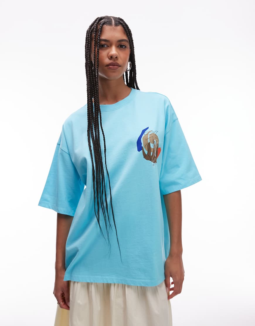 Topshop - Oversize-T-Shirt in Blau mit abstraktem Print am Rücken Topshop - Oversize-T-Shirt in Blau mit abstraktem Print am Rücken von Topshop