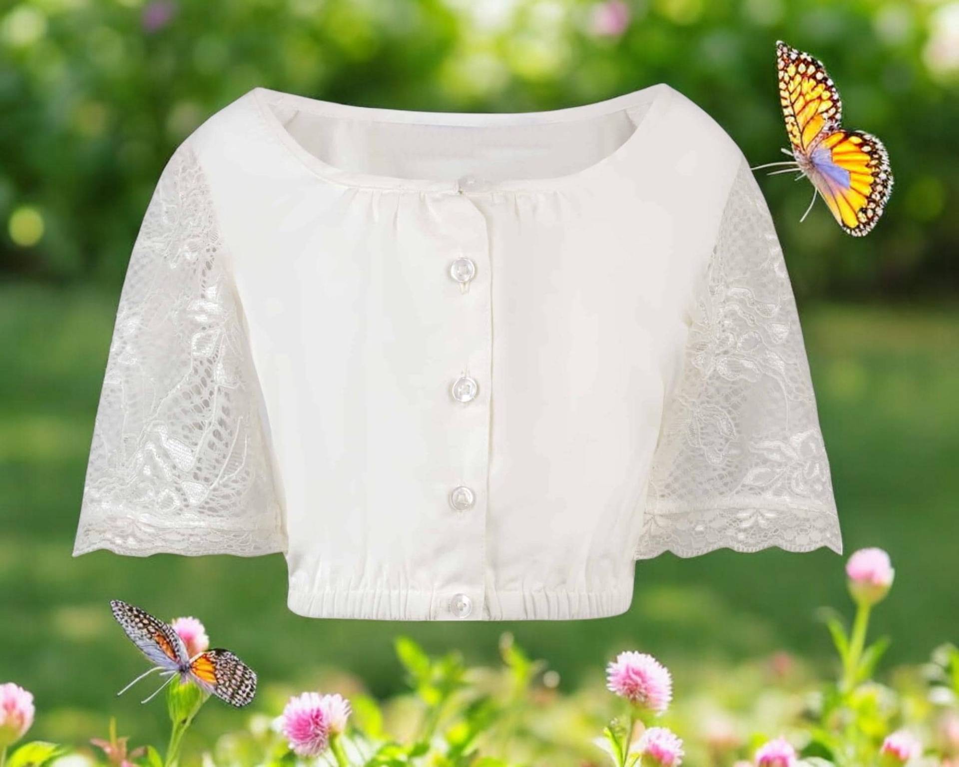 Kinderdirndlbluse Alison Creme - Mädchen-Dirndlbluse Mit Spitzenärmeln Und Traditionellen Knöpfen Von Trachtenhans Kinderdirndlbluse Alison Creme - Mädchen-Dirndlbluse Mit Spitzenärmeln Und Traditionellen Knöpfen Von Trachtenhans von Trachtenhans