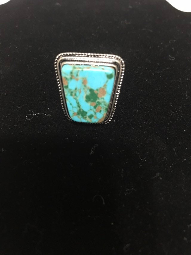 Turquiose Und Silberner Kostümring Turquiose Und Silberner Kostümring von TrendyByTeresa