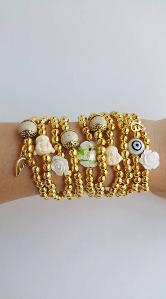 Goldene Metall-Perlen - Amulettarmband Schutz Stretch-Armbänder Buddha Schmuck Stapeln Satz Amulette Auge Weiße Rose Boho Goldene Metall-Perlen - Amulettarmband Schutz Stretch-Armbänder Buddha Schmuck Stapeln Satz Amulette Auge Weiße Rose Boho von TresJoliePT