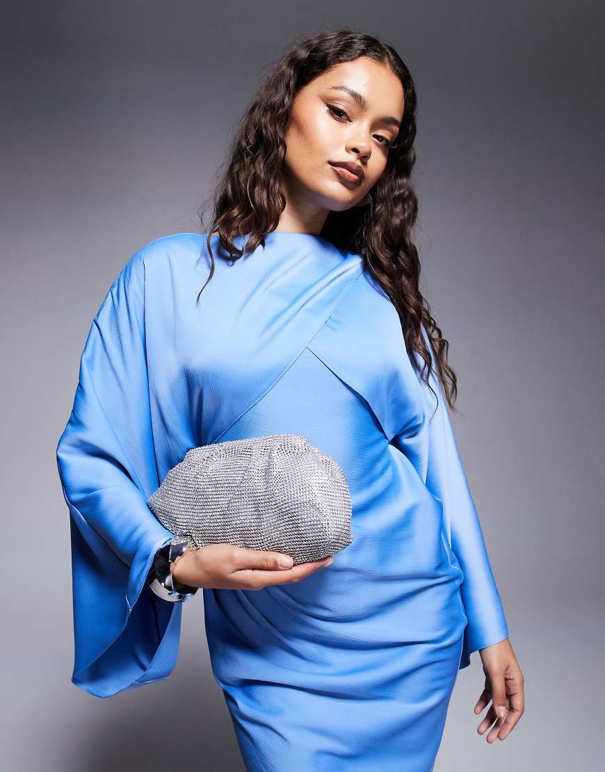 True Decadence - Silberfarbene Clutch in Kissendesign mit Strassverzierung True Decadence - Silberfarbene Clutch in Kissendesign mit Strassverzierung von True Decadence
