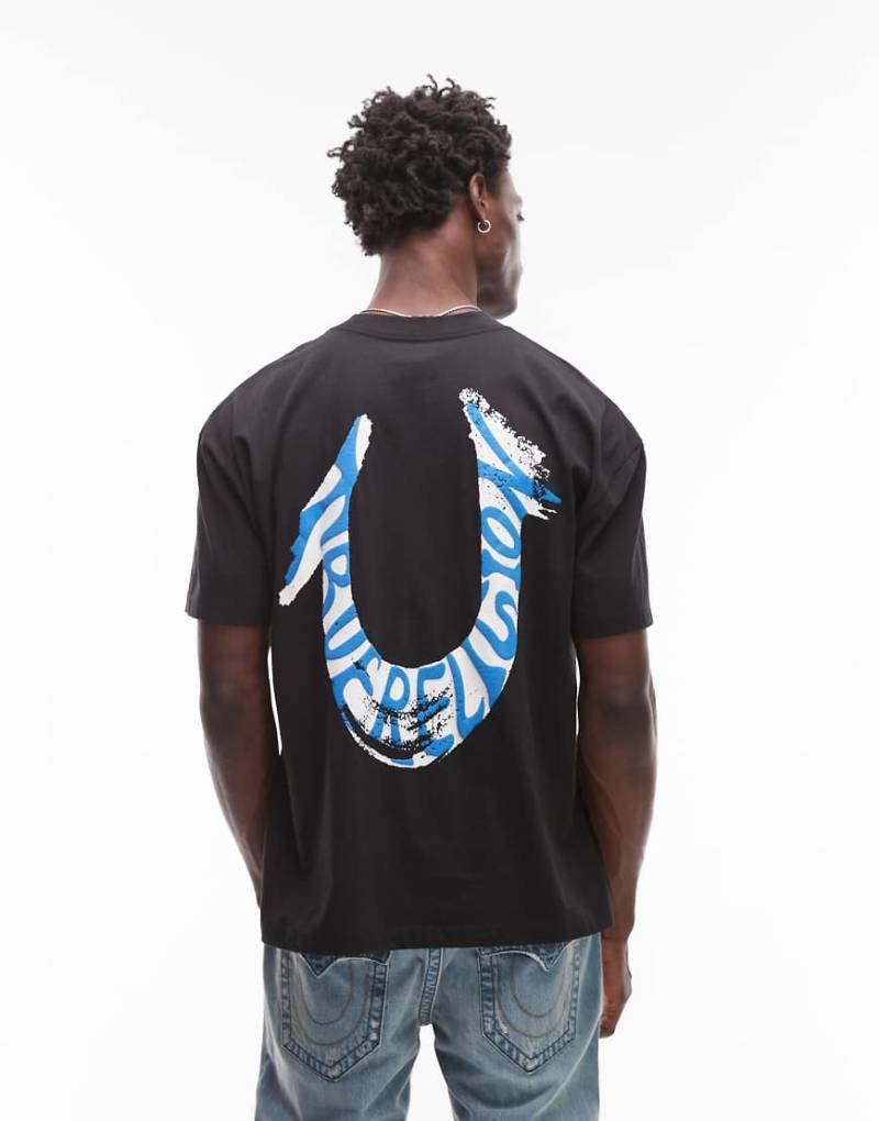 True Religion - Oversize-T-Shirt in Schwarz mit Pinselstrich-Logo auf der Rückseite von True Religion