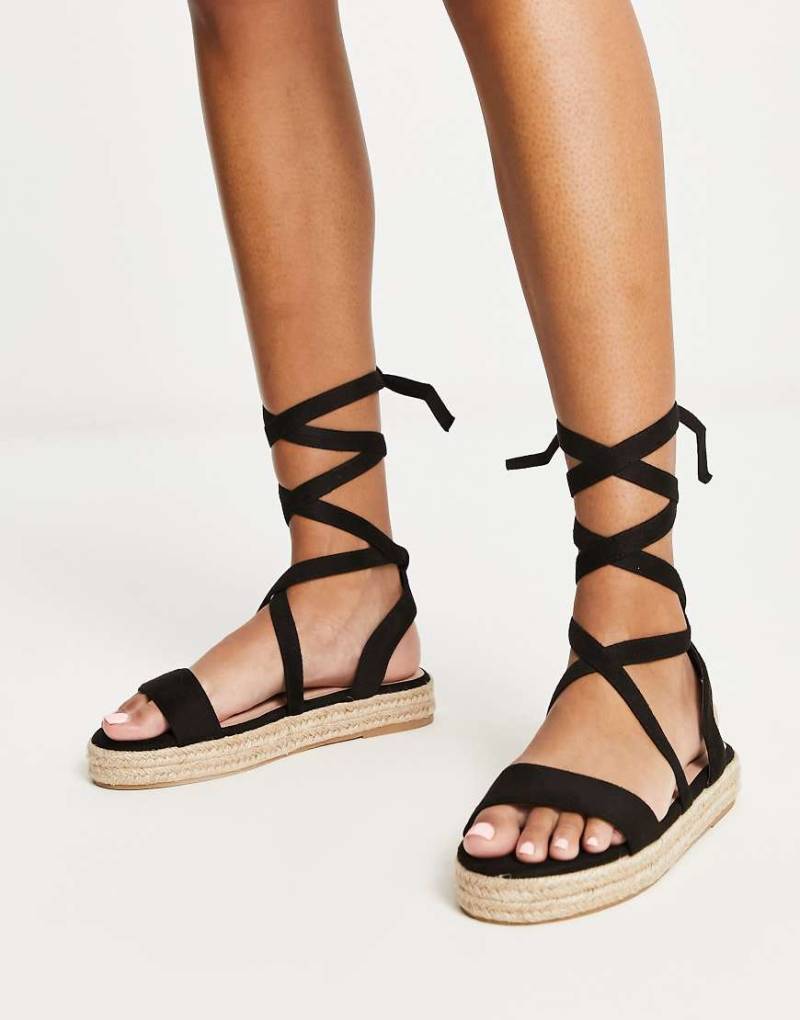 Truffle Collection - Espadrilles-Sandalen mit Beinschnürung in Schwarz von Truffle Collection