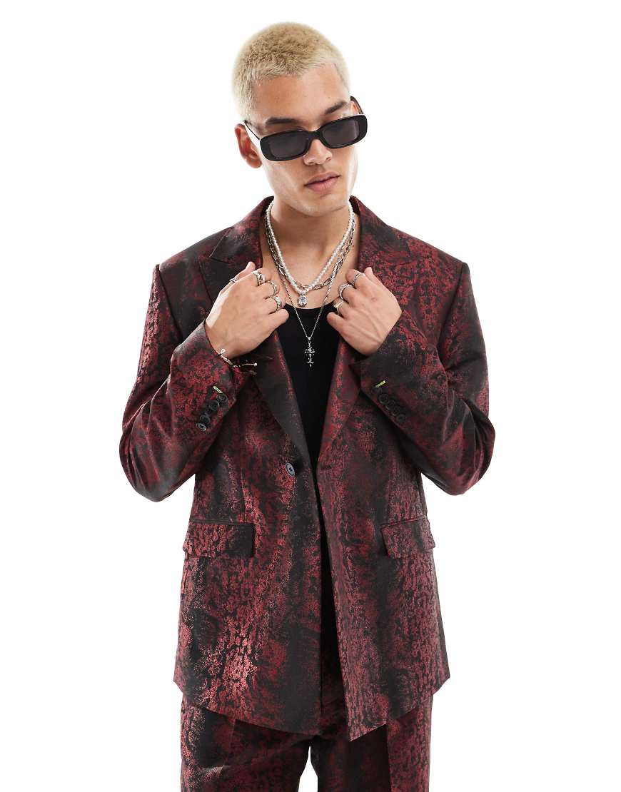 Twisted Tailor - Gemusterte Oversize-Anzugjacke in Schwarz und Rot, Kombiteil Twisted Tailor - Gemusterte Oversize-Anzugjacke in Schwarz und Rot, Kombiteil von Twisted Tailor