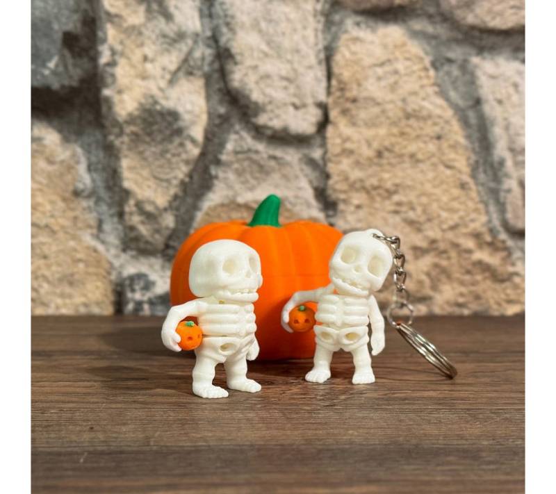 UDINGO Schlüsselanhänger Mini-Skelett mit Kürbis UDINGO Schlüsselanhänger Mini-Skelett mit Kürbis von UDINGO