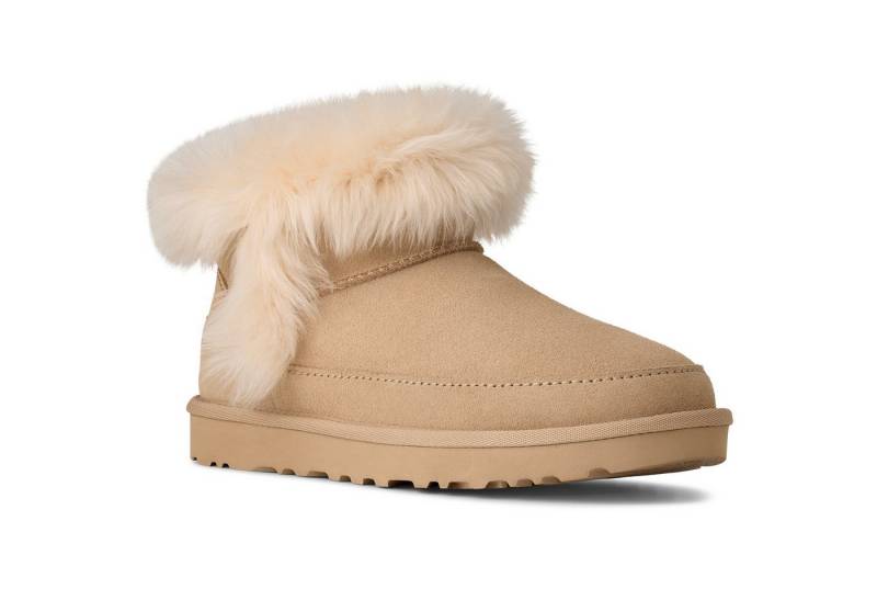 UGG Classic Ultra Mini Chalet Winterboots Ankleboots, Schlupfboots mit modischer Schaffell Verzierung von UGG