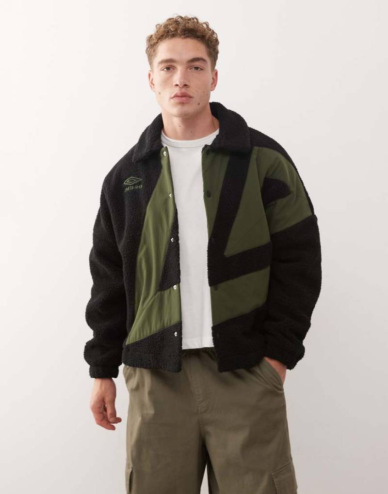 Umbro - Trainerjacke aus Fleece in Schwarz und Grün von Umbro