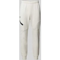 Under Armour Relaxed Fit Sweatpants mit Logo-Print Modell 'Unstoppable' in Offwhite, Größe XXL von Under Armour