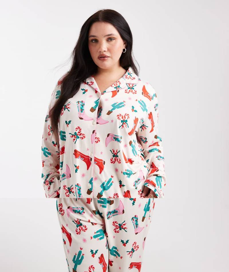 Urban Threads Curve - Weihnachtlicher Pyjama, bestehend aus langärmligem Hemd mit Reverskragen und Hose mit Cowboyprint-Bunt von Urban Threads