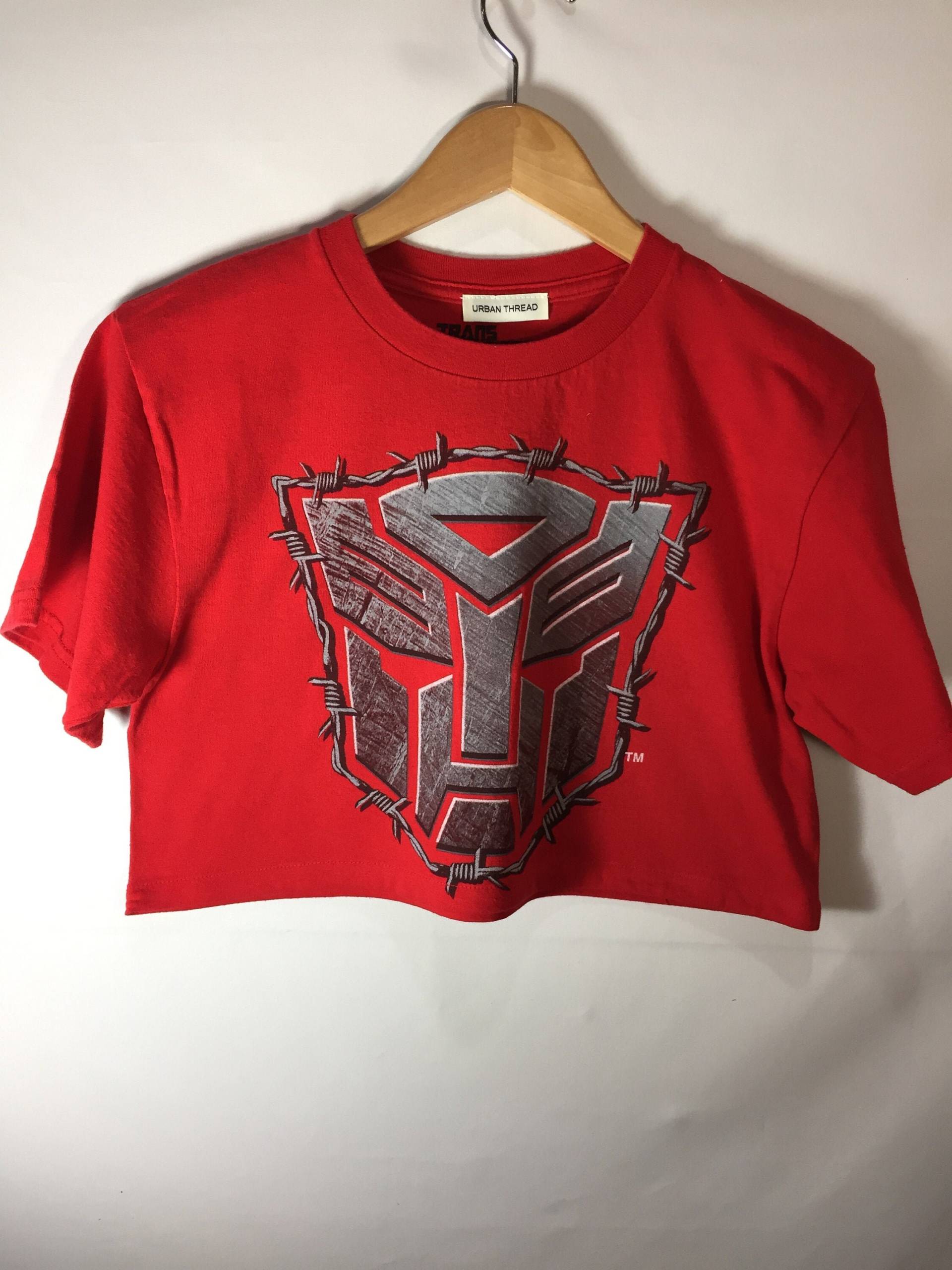 Small Transformers Cropped T-Shirt Small Transformers Cropped T-Shirt von UrbanThreadProject