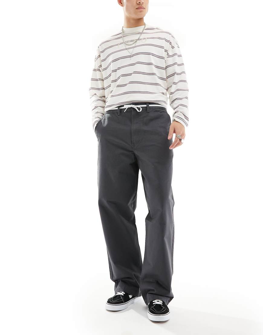 Vans Authentic - Weit geschnittene Chinohose in Dunkelgrau Vans Authentic - Weit geschnittene Chinohose in Dunkelgrau von Vans
