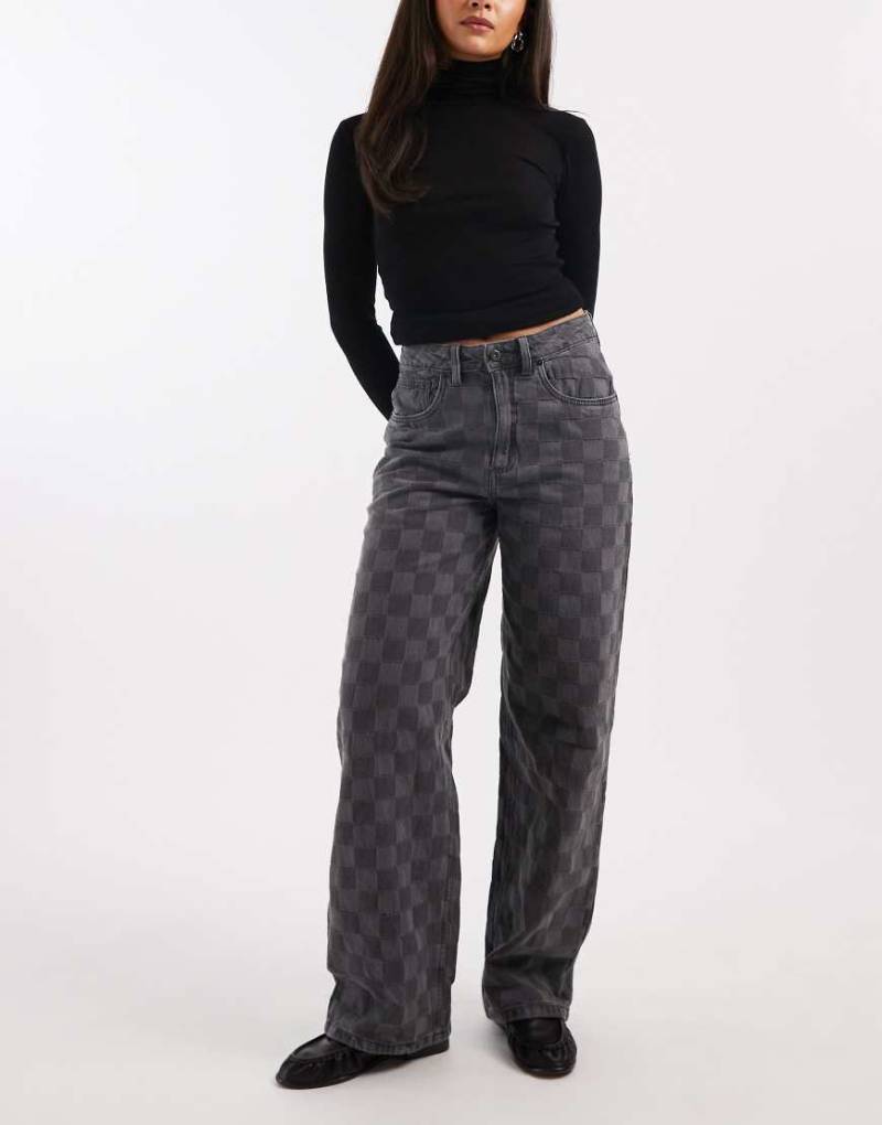 Vans - Sirelle - Bodenlange Hose in verblasstem Schwarz mit Karomuster Vans - Sirelle - Bodenlange Hose in verblasstem Schwarz mit Karomuster von Vans