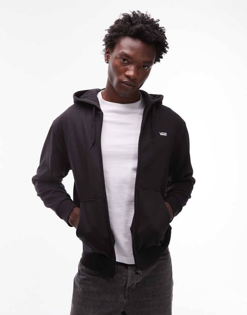 Vans - Trainingsjacke in Schwarz mit Logo auf der linken Brust und durchgehendem Reißverschluss von Vans