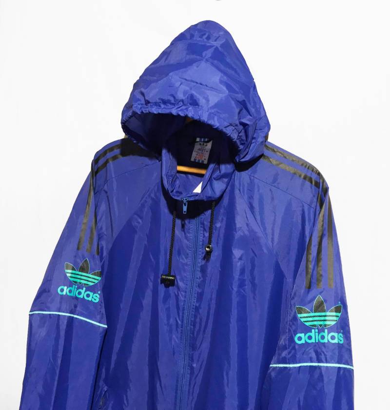 Adidas 80Er Jahre Trefoil Windbreaker Vintage Cagoule Jacke Blau/Schwarz/Grün Größe L Adidas 80Er Jahre Trefoil Windbreaker Vintage Cagoule Jacke Blau/Schwarz/Grün Größe L von VapeoVintage