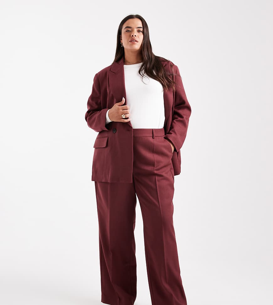 Vero Moda Curve - Elegante Hose in Burgunderrot mit weitem Bein und Fischgrätenmuster, Kombiteil Vero Moda Curve - Elegante Hose in Burgunderrot mit weitem Bein und Fischgrätenmuster, Kombiteil von Vero Moda Curve