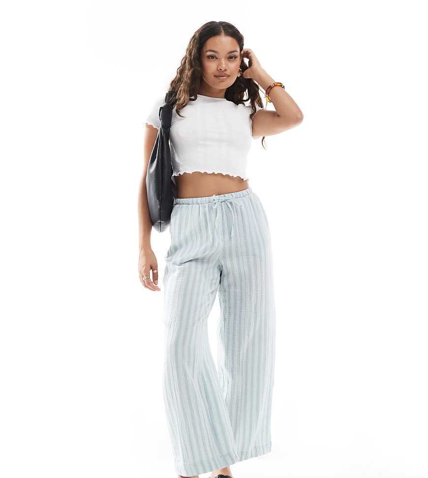 Vero Moda Petite - Baumwoll-Hose in gestreiftem Grün mit weitem Bein Vero Moda Petite - Baumwoll-Hose in gestreiftem Grün mit weitem Bein von Vero Moda Petite