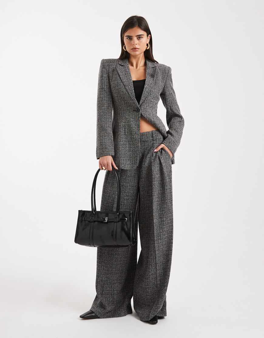 Vero Moda - Elegante Tweed-Hose in meliertem Schwarz mit weitem Bein und Bügelfalte vorne, Kombiteil Vero Moda - Elegante Tweed-Hose in meliertem Schwarz mit weitem Bein und Bügelfalte vorne, Kombiteil von Vero Moda