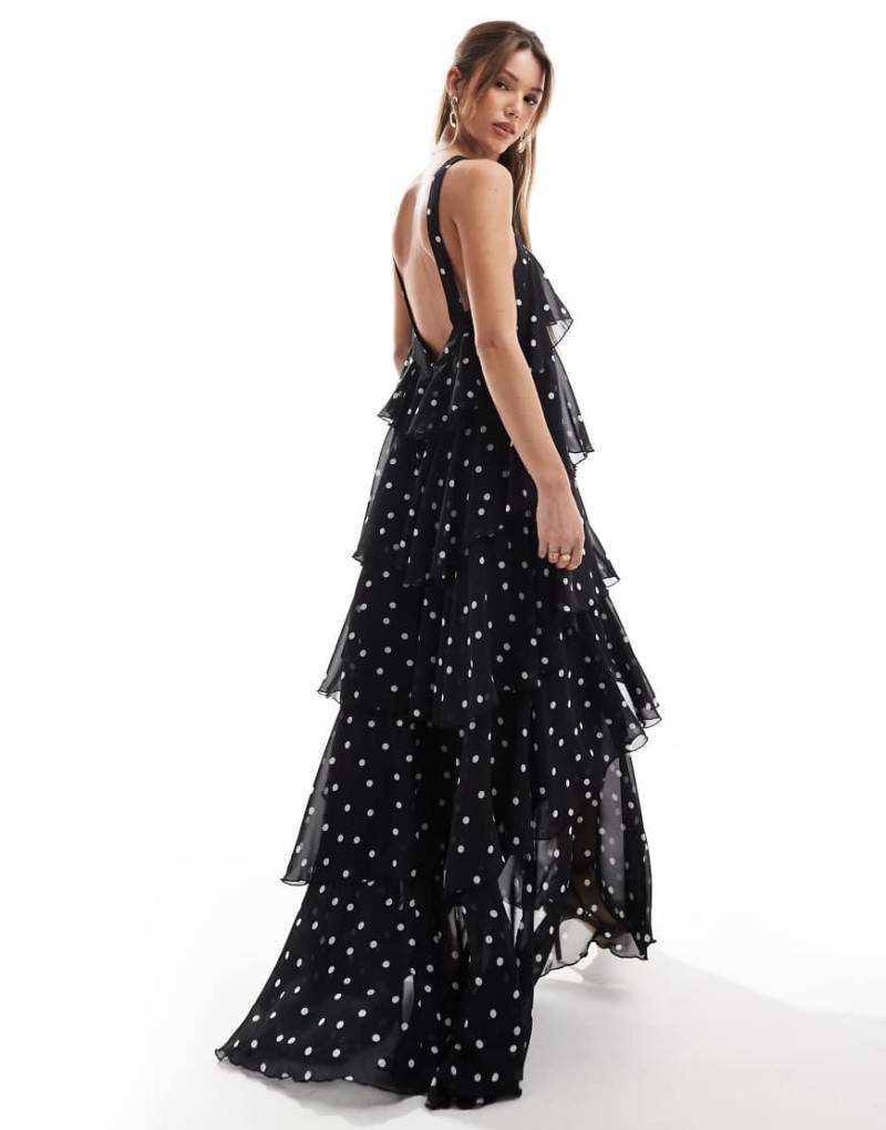 Vero Moda - Felicia - Gestuftes Neckholder-Maxikleid in Schwarz mit Punkten und Ansteckblumendetail von Vero Moda