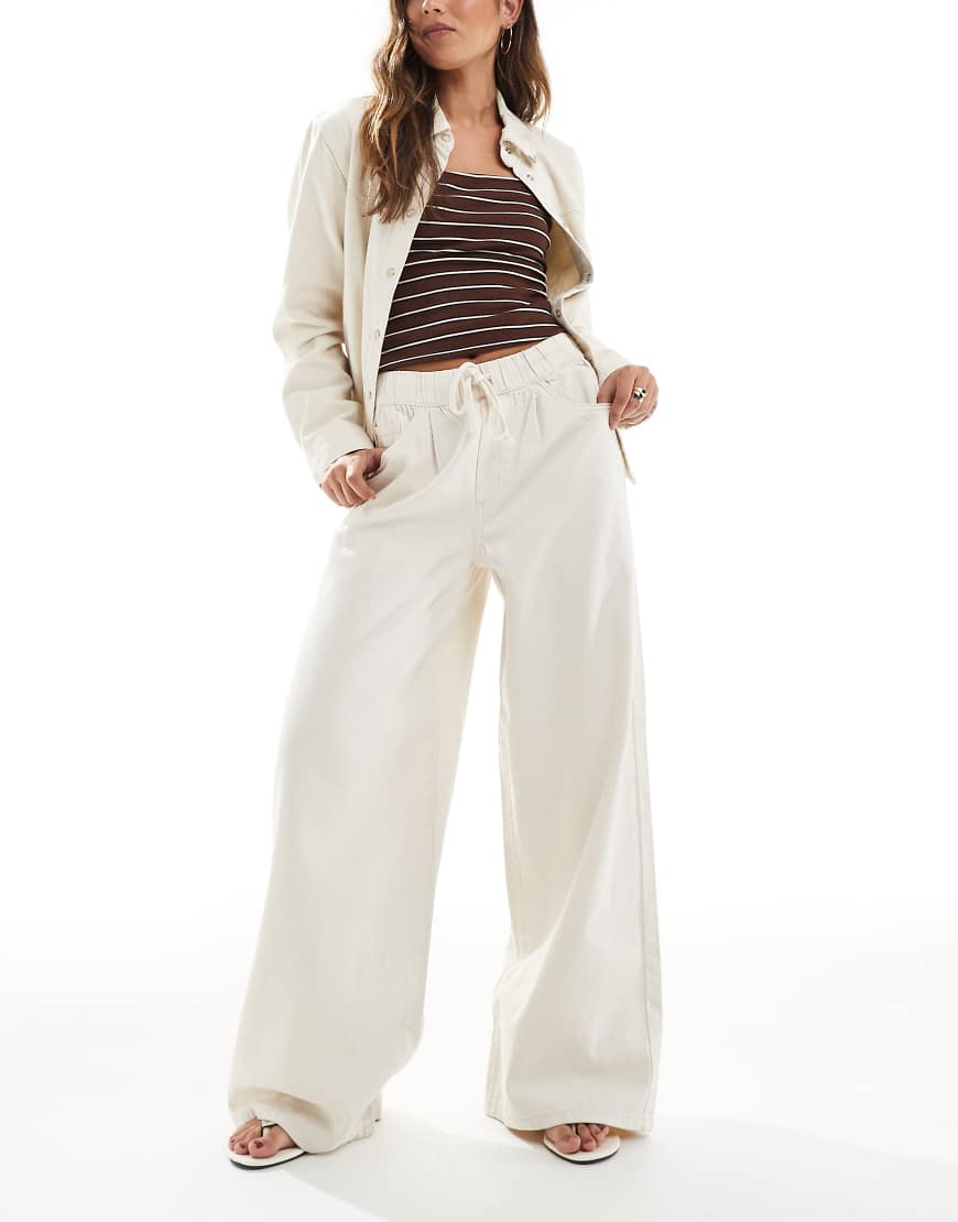 Vero Moda - Jeans in Ecru mit weitem Bein und Bindebund-Weiß Vero Moda - Jeans in Ecru mit weitem Bein und Bindebund-Weiß von Vero Moda