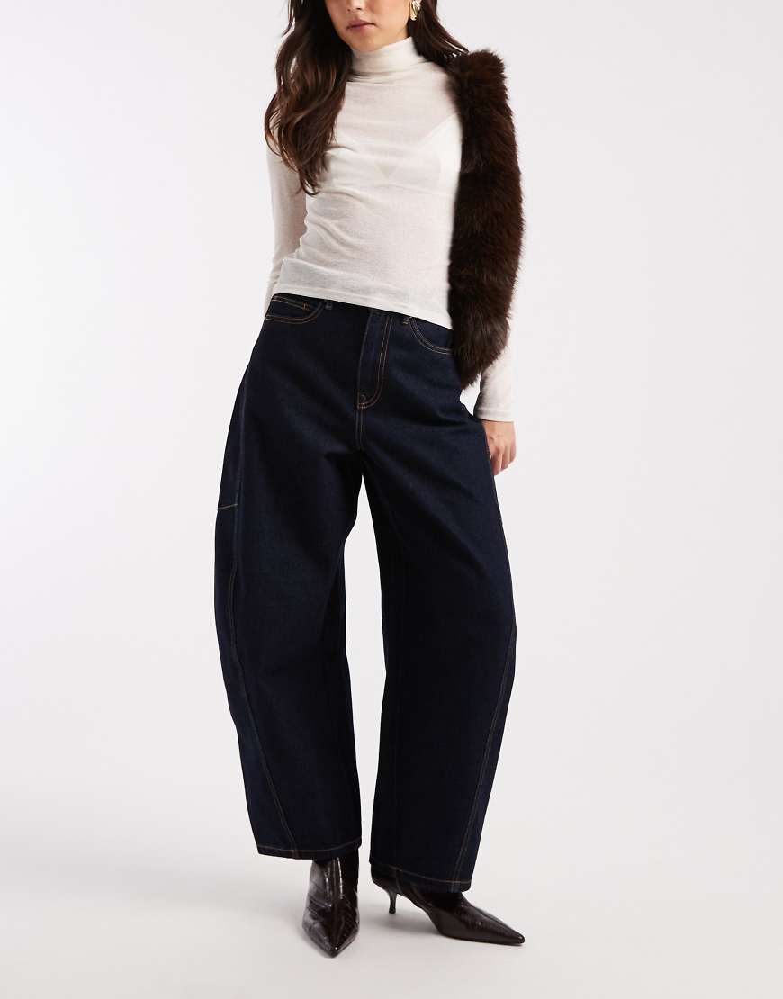 Vero Moda - Kaitlin - Jeans in unbehandeltem Indigoblau mit weitem Bein und Kontrastnähten-Marineblau von Vero Moda