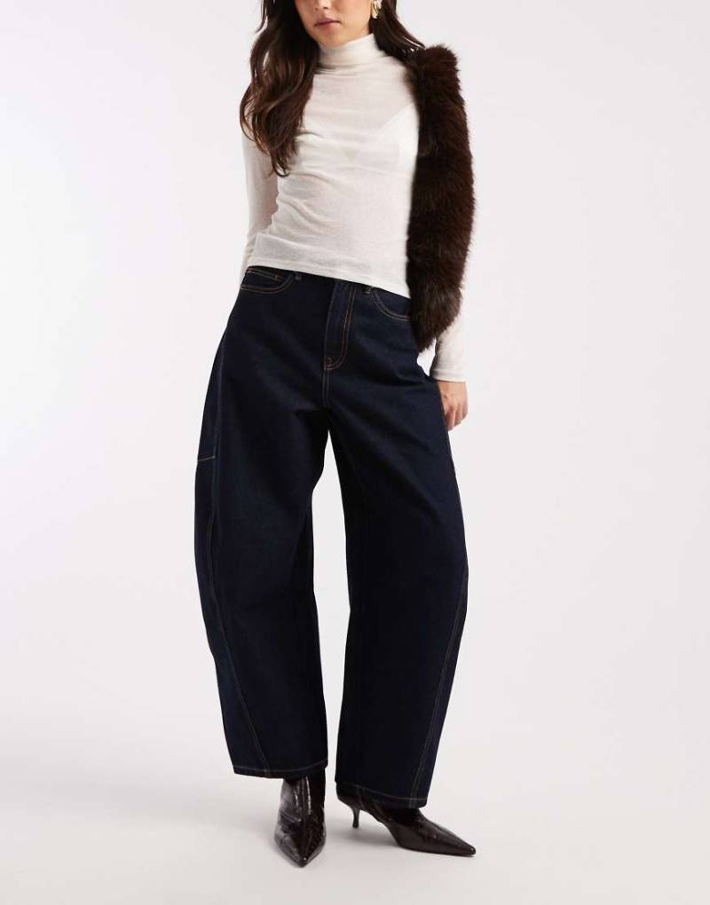 Vero Moda - Kaitlin - Jeans in unbehandeltem Indigoblau mit weitem Bein und Kontrastnähten-Marineblau von Vero Moda