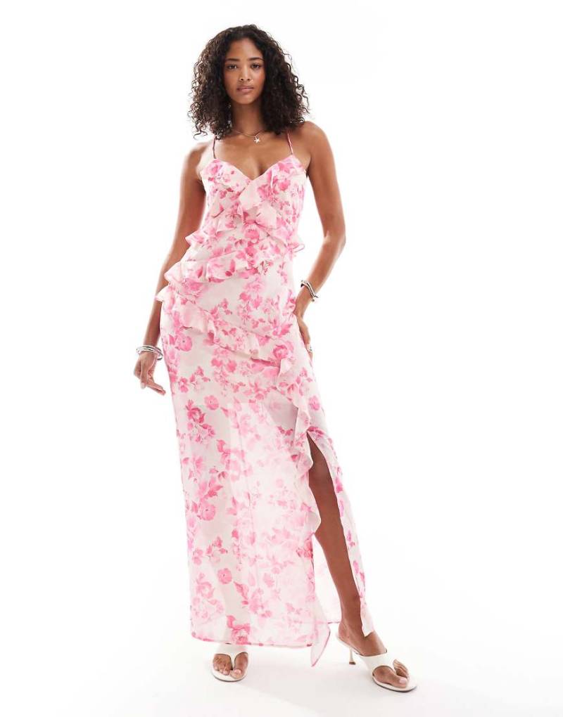 Vero Moda - Maxi-Trägerkleid in Pastellrosa mit Rüschen und Blumenmuster Vero Moda - Maxi-Trägerkleid in Pastellrosa mit Rüschen und Blumenmuster von Vero Moda