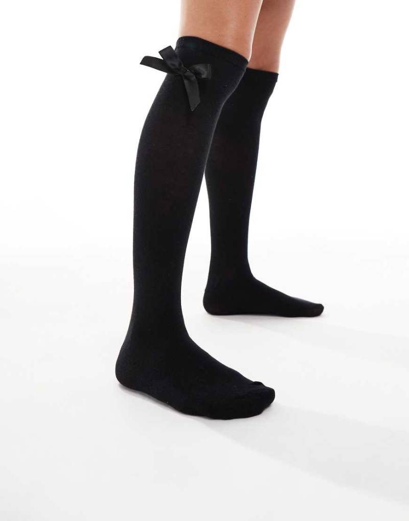 Vero Moda - Overknee-Strümpfe in Schwarz mit Schleifenbesatz Vero Moda - Overknee-Strümpfe in Schwarz mit Schleifenbesatz von Vero Moda