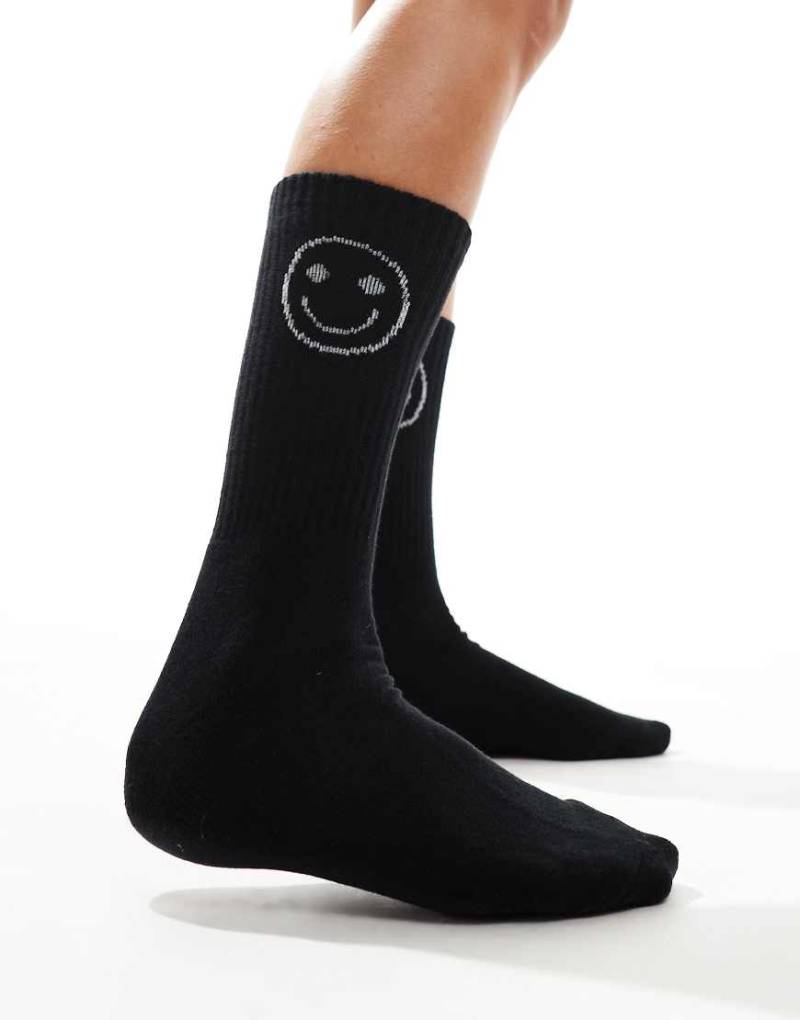 Vero Moda - Sportliche, gerippte Socken in Schwarz mit Smiley-Motiv von Vero Moda