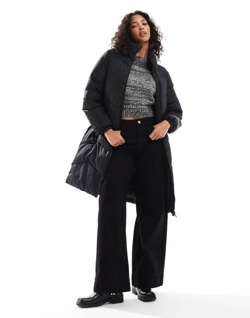Vero Moda - Wattierter, Longline-Mantel in Schwarz Vero Moda - Wattierter, Longline-Mantel in Schwarz von Vero Moda