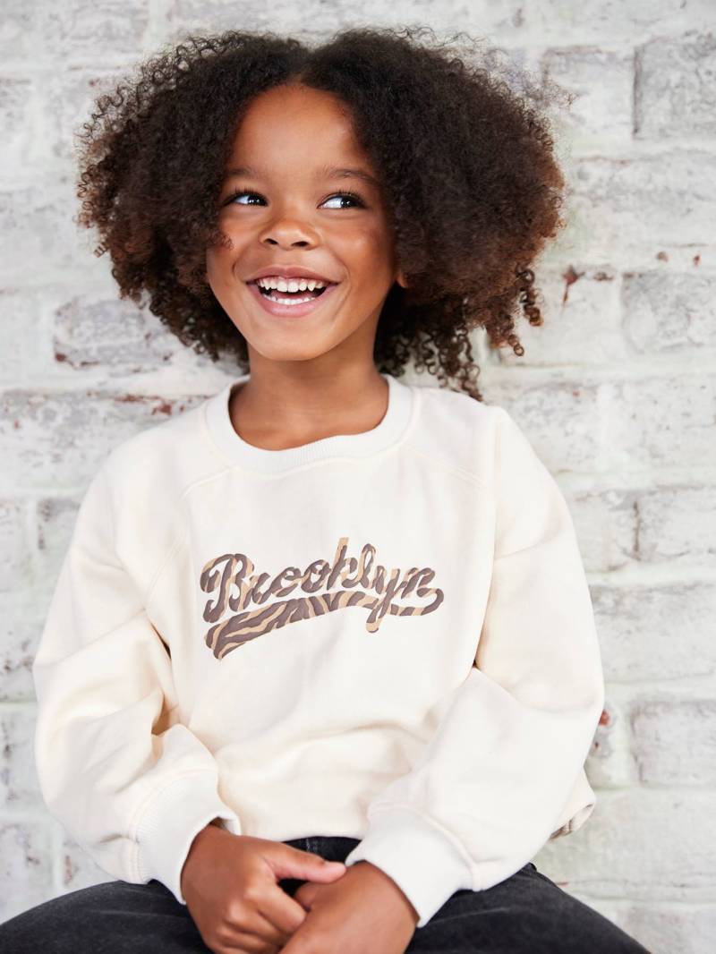 Mädchen-Sweatshirt mit Brooklyn-Print und Zebramuster Mädchen-Sweatshirt mit Brooklyn-Print und Zebramuster von Vertbaudet