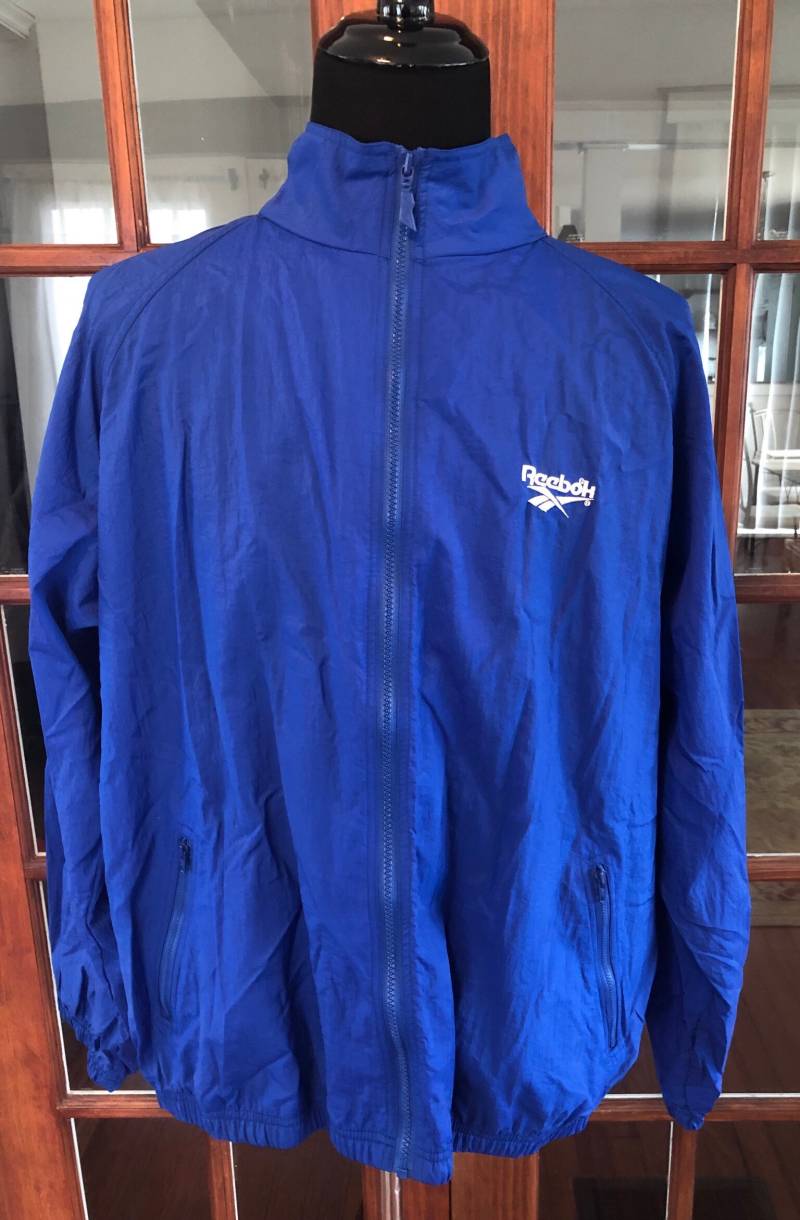 Jahrgang 1990 Reebok Warmup Windbreaker Trainingsjacke Jahrgang 1990 Reebok Warmup Windbreaker Trainingsjacke von VintageFindsMichael