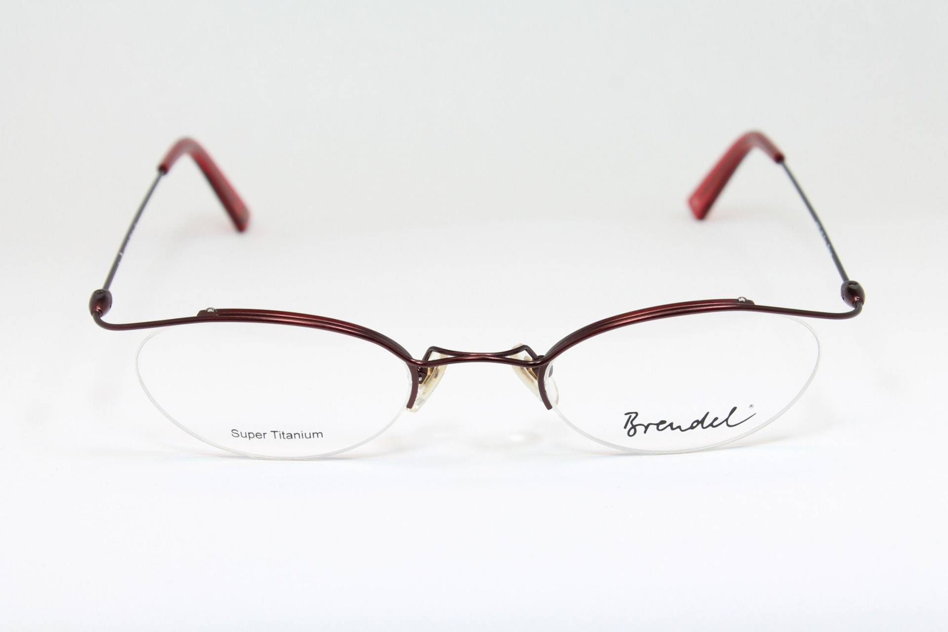 Oval Halbrand Super Titanium Burgundy Brendel 8657 C46 Top Bar Vintage Brillengestell Brille Lunettes Gafas Bril Glasögon E100 Oval Halbrand Super Titanium Burgundy Brendel 8657 C46 Top Bar Vintage Brillengestell Brille Lunettes Gafas Bril Glasögon E100 von VintageGermanGlasses