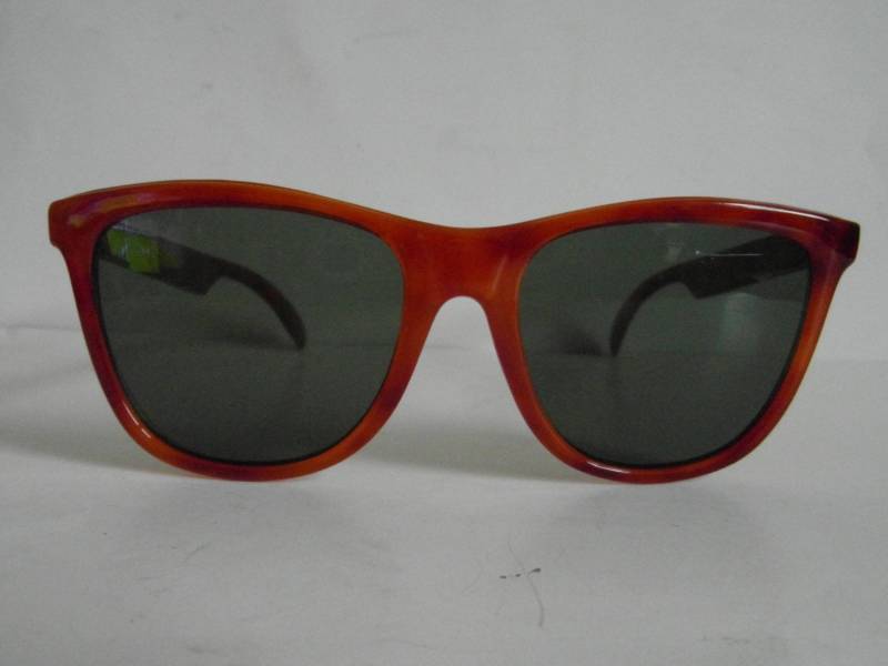 Orange-Braune Vintage Sonnenbrille Mit D-Rahmen in Schildpattoptik Orange-Braune Vintage Sonnenbrille Mit D-Rahmen in Schildpattoptik von VintageSilo
