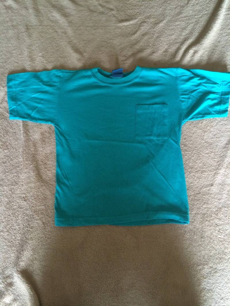 Vintage 90Er Jahre Körper Ragz Aqua Farbige Kurzarm Tasche T-Shirt Vintage 90Er Jahre Körper Ragz Aqua Farbige Kurzarm Tasche T-Shirt von VintageVanShop