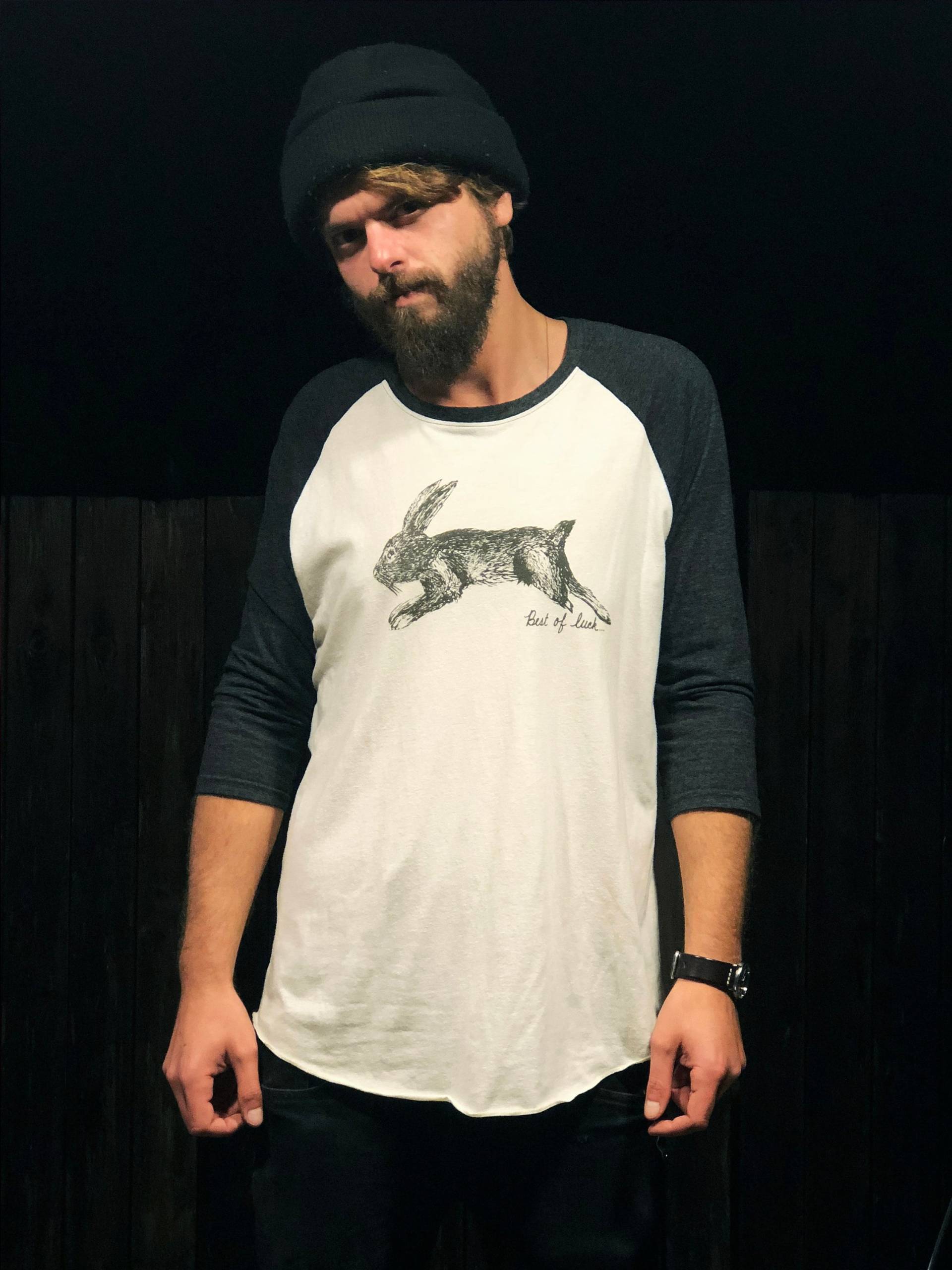 Best Of Luck Unisex Baseball T-Shirt | Natural & Heather Charcoal Best Of Luck Unisex Baseball T-Shirt | Natural & Heather Charcoal von VonBrutonPrintshop