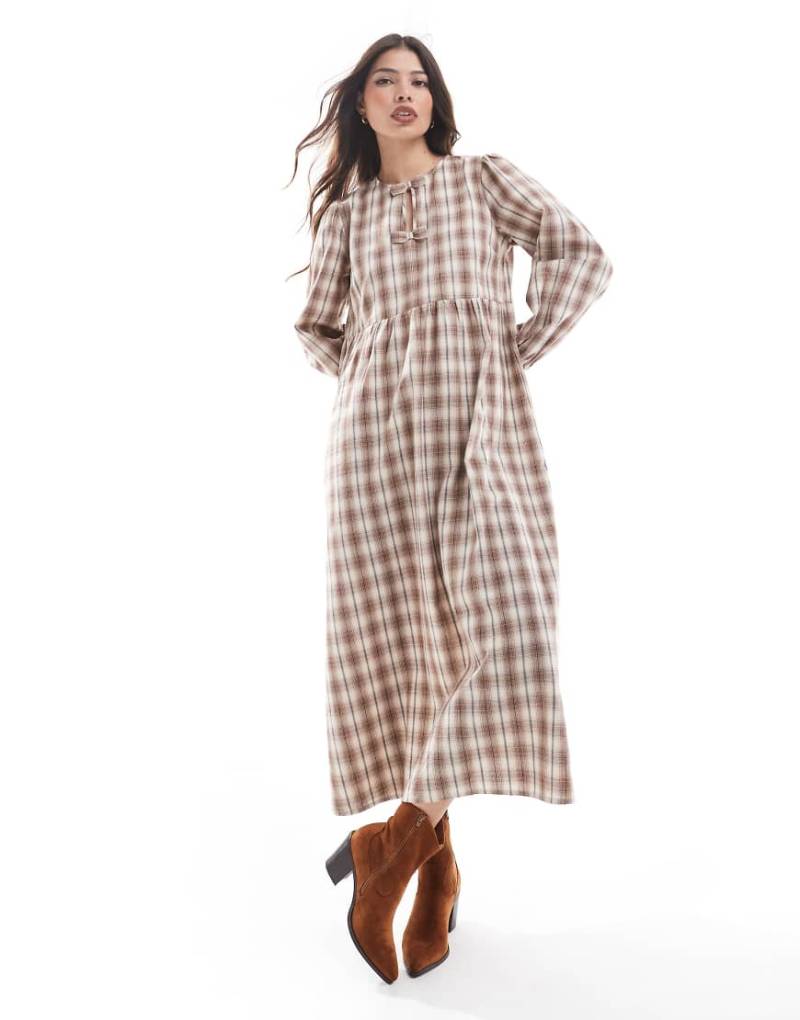 Wednesday's Girl - Gesmoktes Midaxi-Kleid in grau kariert Wednesday's Girl - Gesmoktes Midaxi-Kleid in grau kariert von Wednesday's Girl