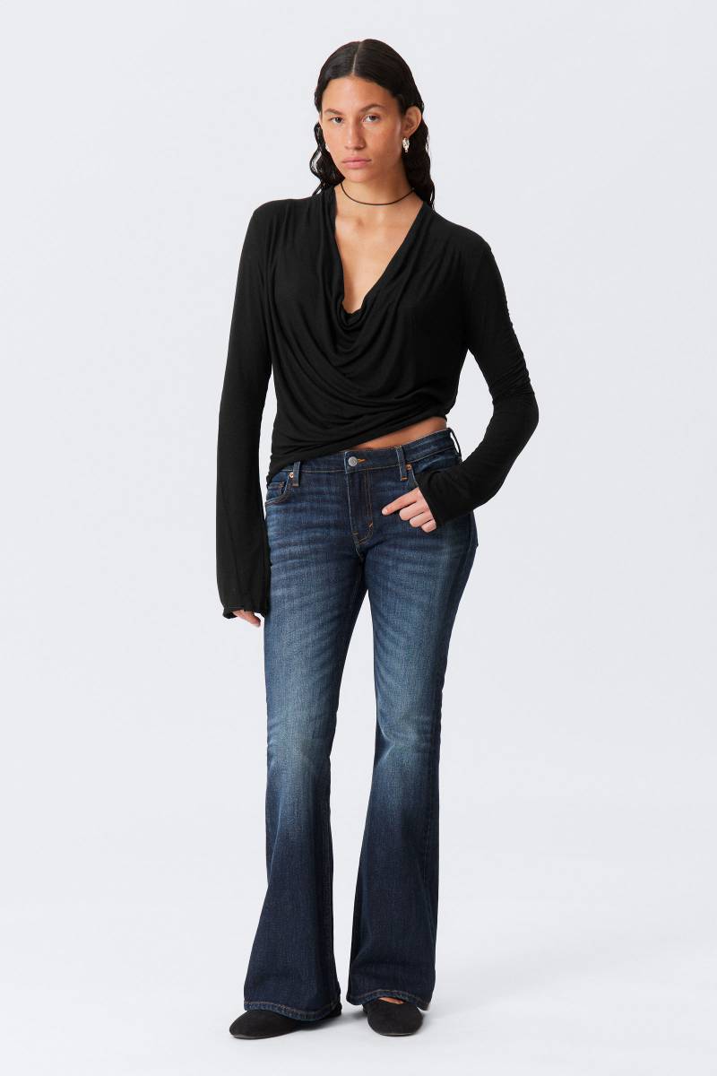 Flame Low Rise Slim Flared Leg Jeans von Weekday