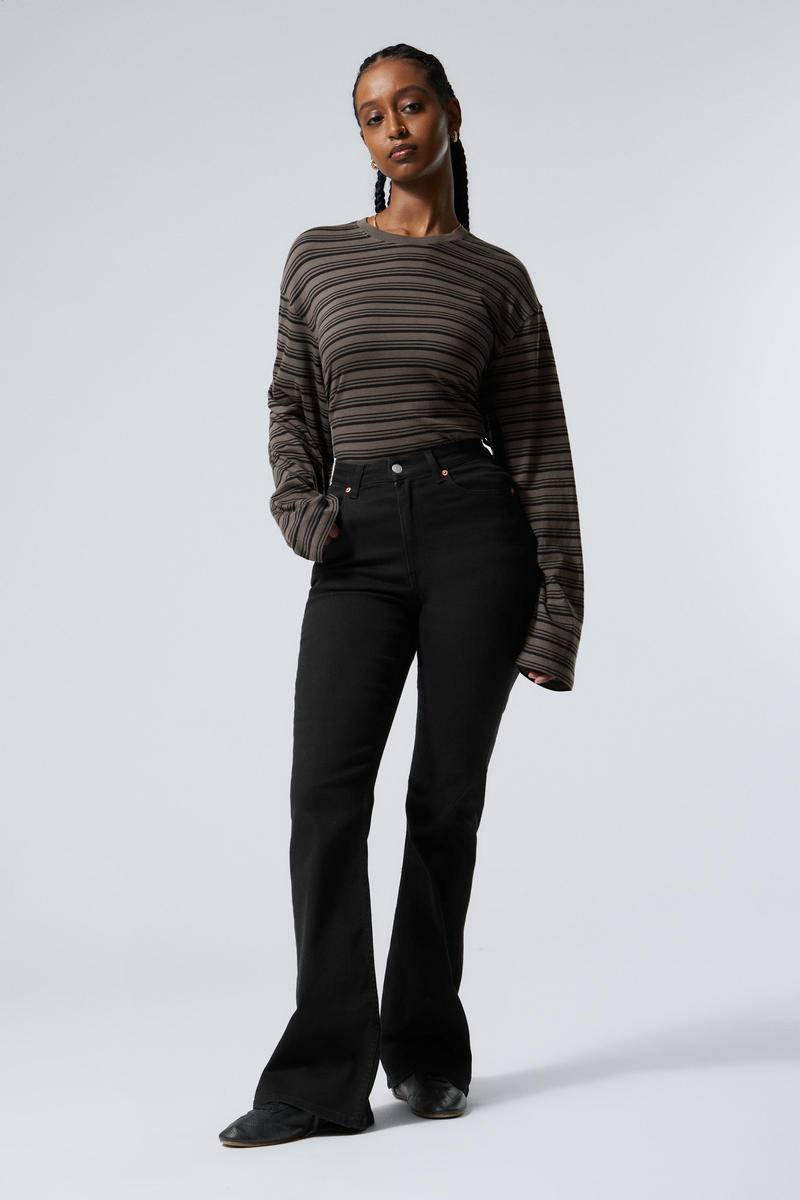 Glow Curve High Waisted Regular Flared Leg Jeans von Weekday