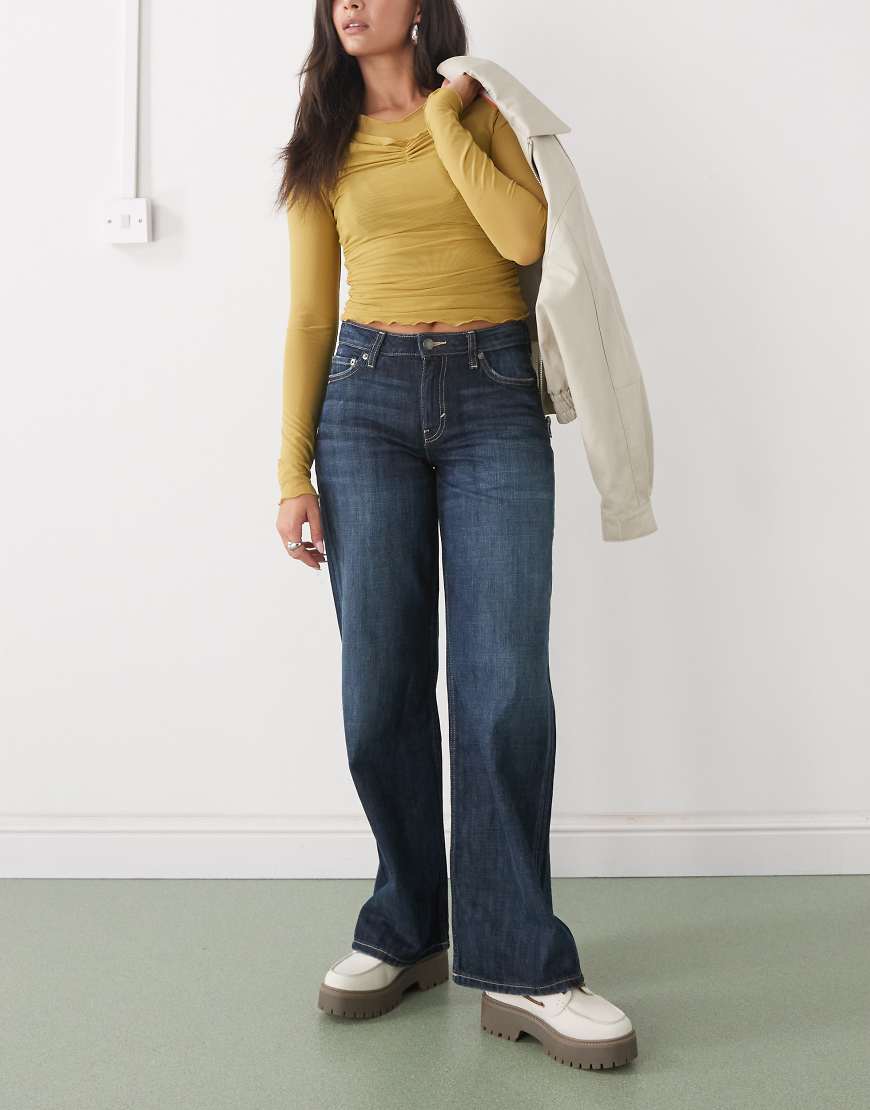 Weekday - Ample - Weit geschnittene Jeans in dunkelblauer Waschung mit niedrigem Bund von Weekday