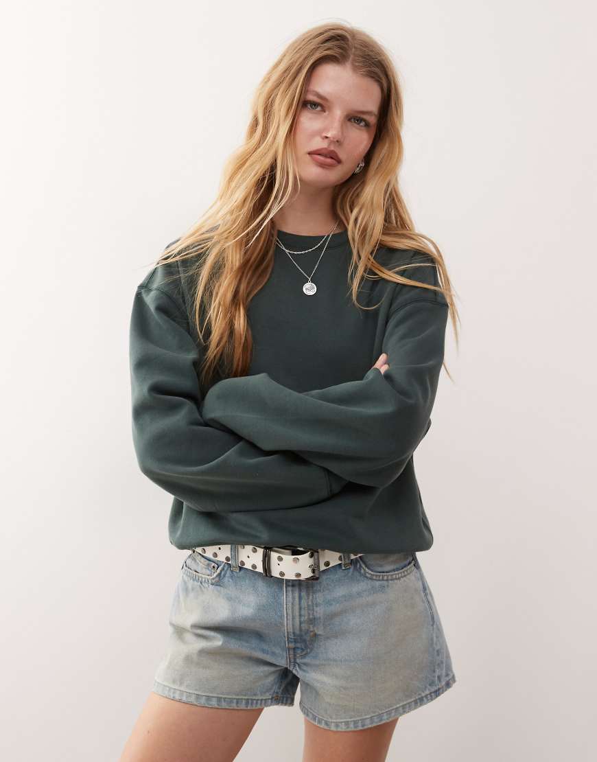 Weekday - Essence - Sweatshirt in Petrolgrün Weekday - Essence - Sweatshirt in Petrolgrün von Weekday