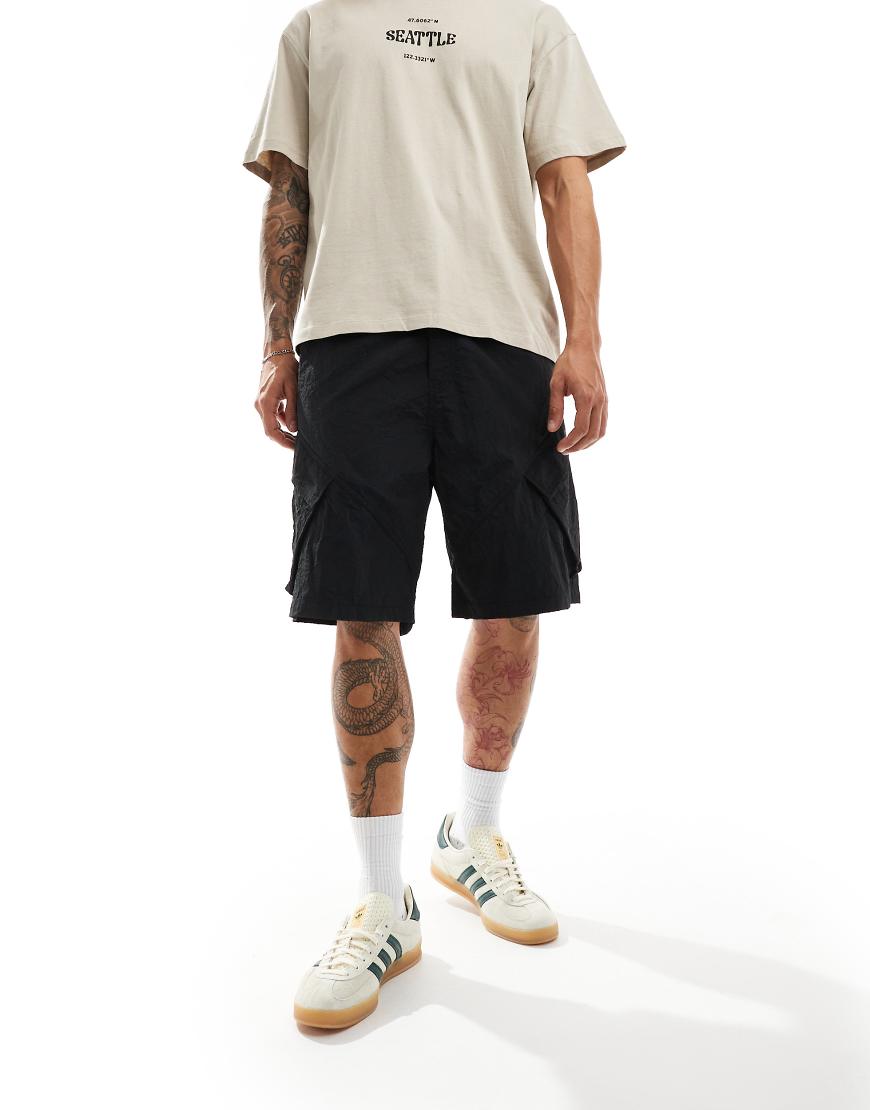 Weekday - Frode - Locker geschnittene Cargo-Shorts in Schwarz Weekday - Frode - Locker geschnittene Cargo-Shorts in Schwarz von Weekday