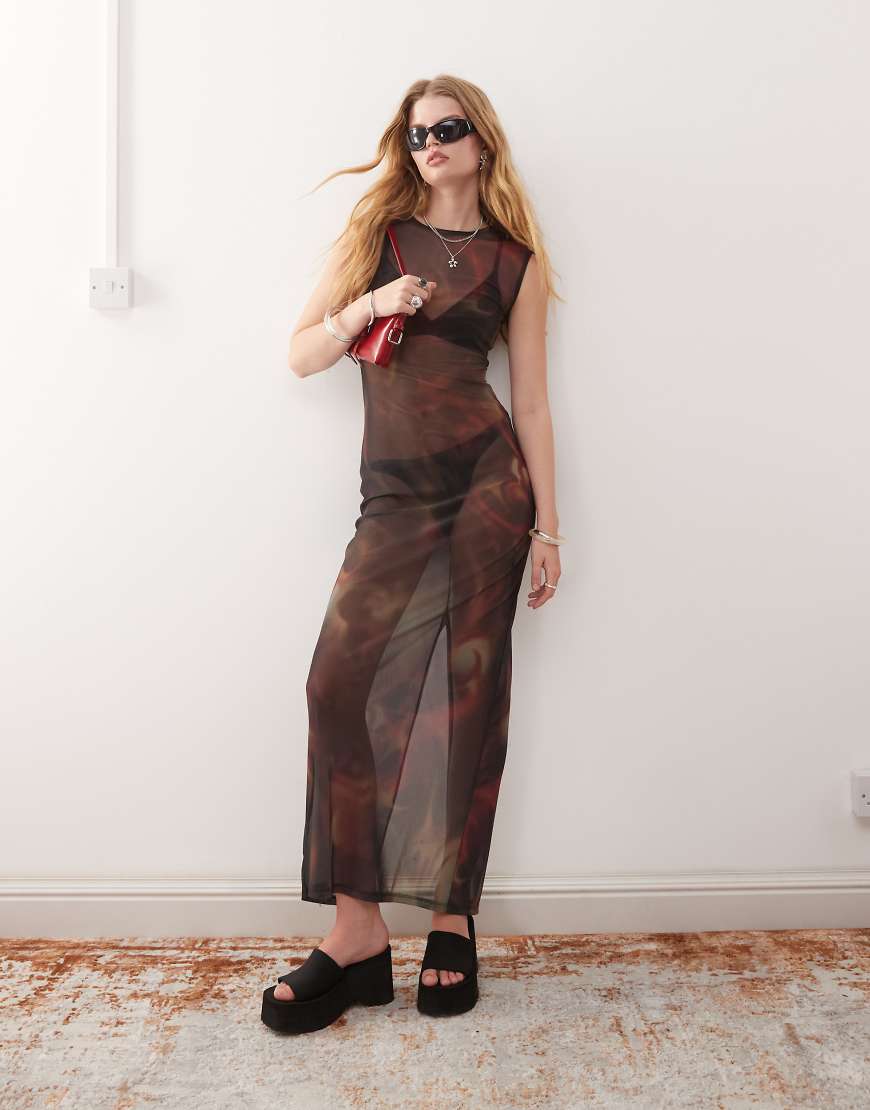 Weekday - Gemustertes Maxikleid aus Netzstoff in Schwarz Weekday - Gemustertes Maxikleid aus Netzstoff in Schwarz von Weekday