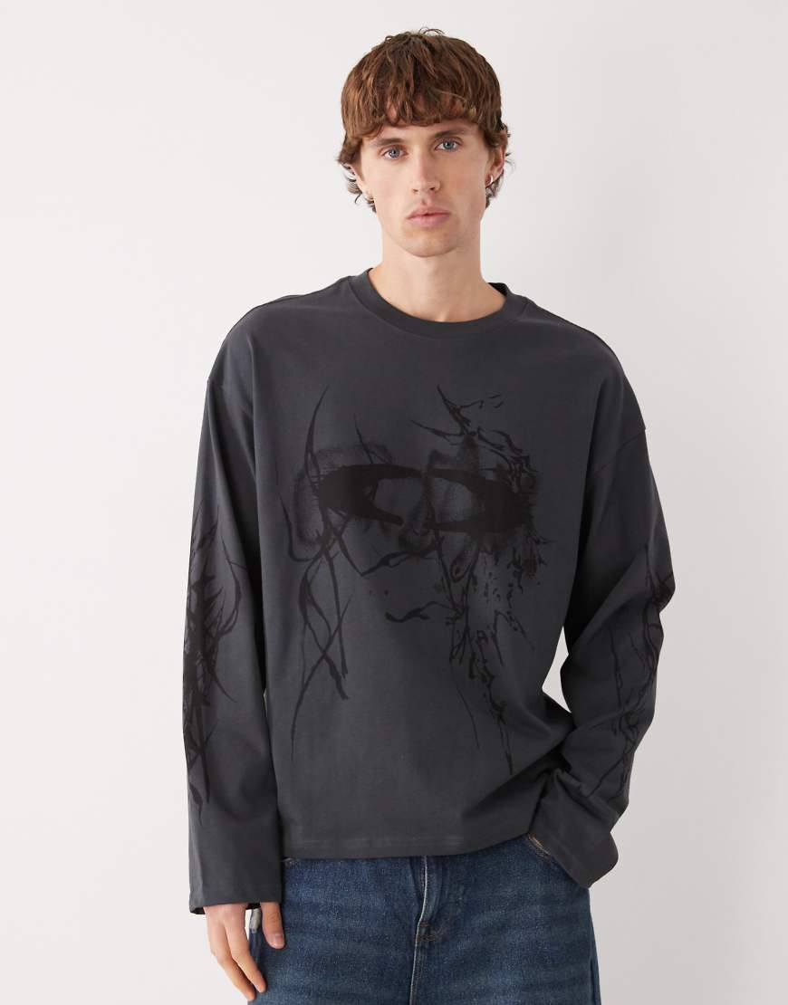 Weekday - Great - Kastiges T-Shirt in gebrochenem Schwarz mit „Big Mess"-Motiv Weekday - Great - Kastiges T-Shirt in gebrochenem Schwarz mit „Big Mess"-Motiv von Weekday