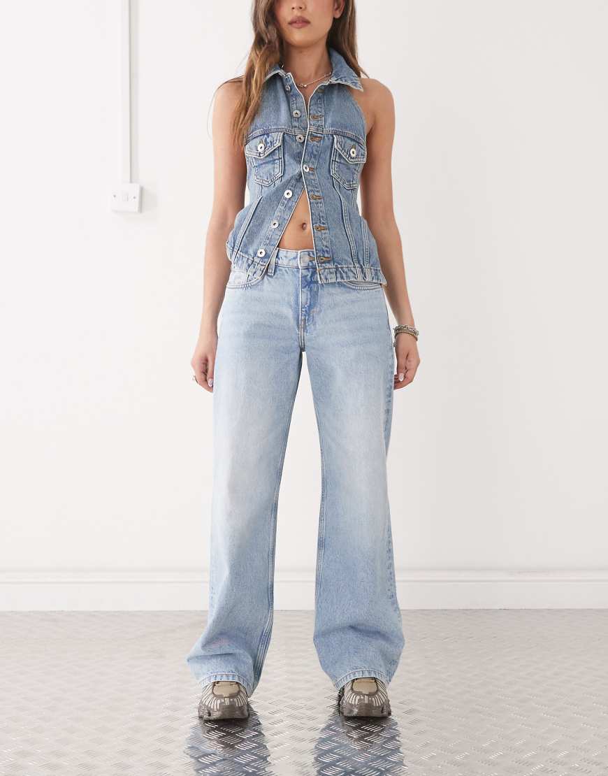 Weekday - Imoo - Jeans in verwaschenem Blau mit niedrigem Bund und weitem Bein Weekday - Imoo - Jeans in verwaschenem Blau mit niedrigem Bund und weitem Bein von Weekday
