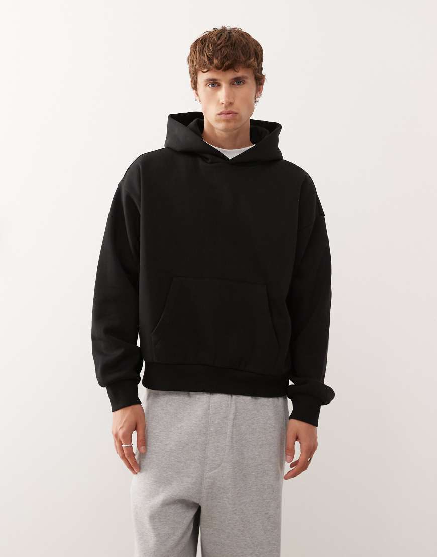 Weekday - Kastiger Oversize-Kapuzenpullover aus schwerem Jersey in Schwarz von Weekday