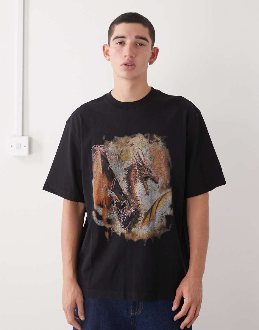 Weekday - Lässig geschnittenes Oversize-T-Shirt in Schwarz mit Drachenprint im Vintage-Design von Weekday