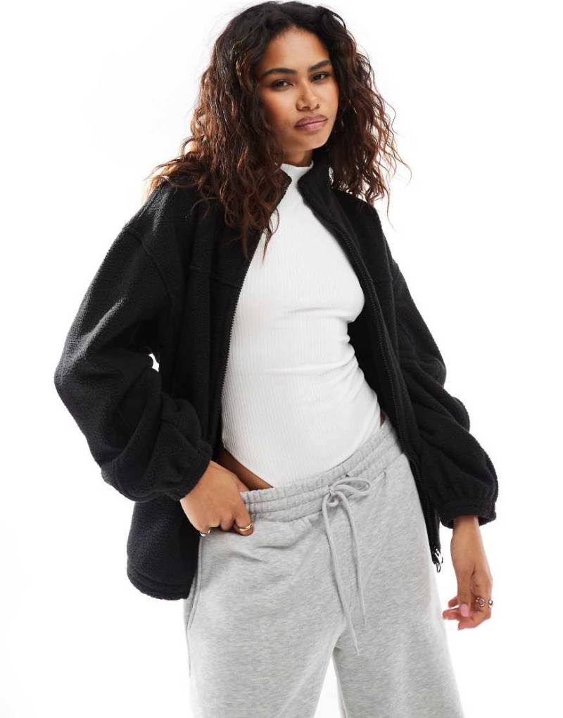 Weekday - Lea - Teddyfell-Sweatshirt in Schwarz mit Oversize-Schnitt und durchgehendem Reißverschluss von Weekday