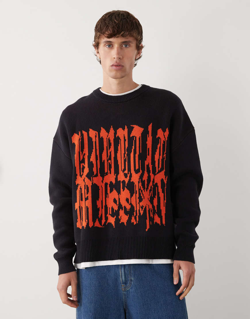 Weekday - Oversize-Pullover in Schwarz mit roter Grafik und Jacquard-Detail Weekday - Oversize-Pullover in Schwarz mit roter Grafik und Jacquard-Detail von Weekday