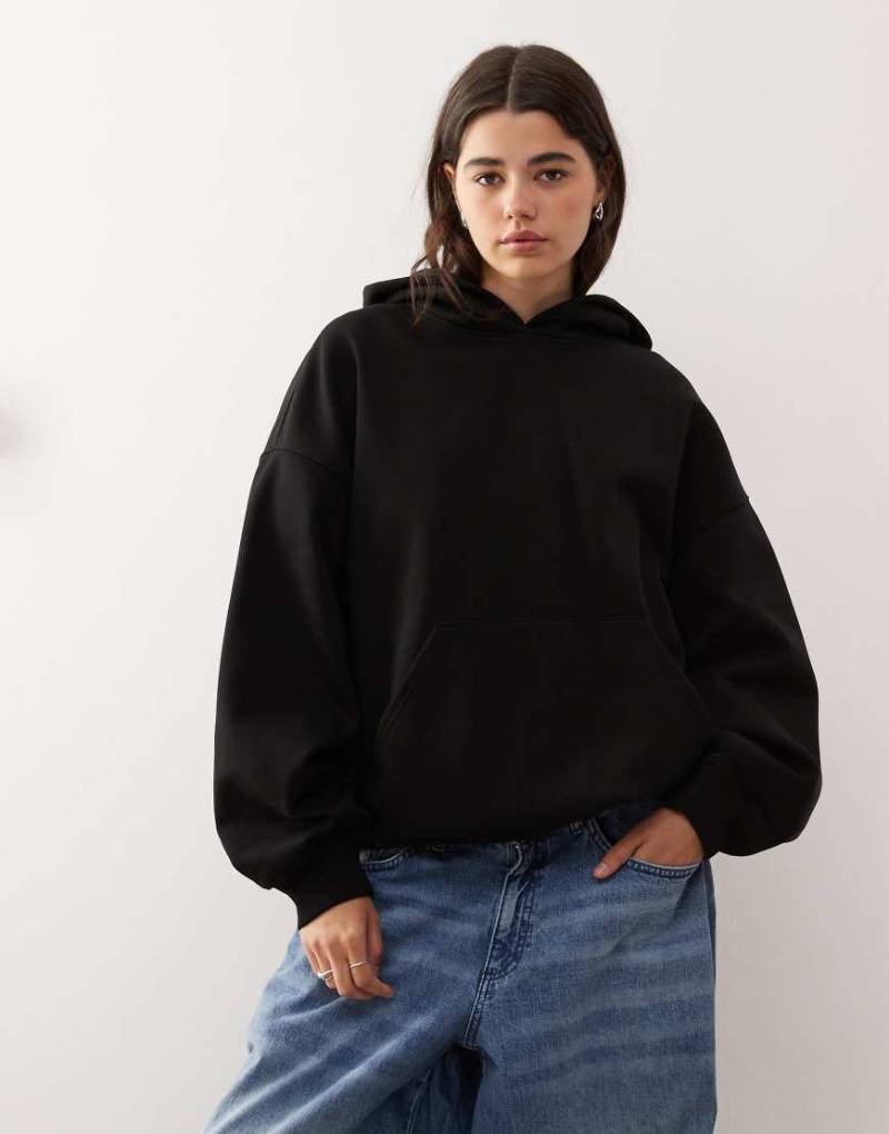 Weekday - Schwerer Jersey-Kapuzenpullover in Schwarz im Oversized Fit von Weekday